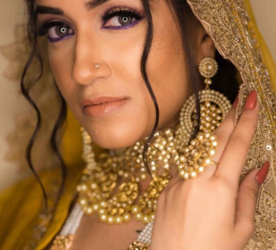 Bride With yellow lehenga and golden jewels