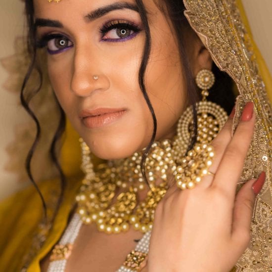 Bride With yellow lehenga and golden jewels