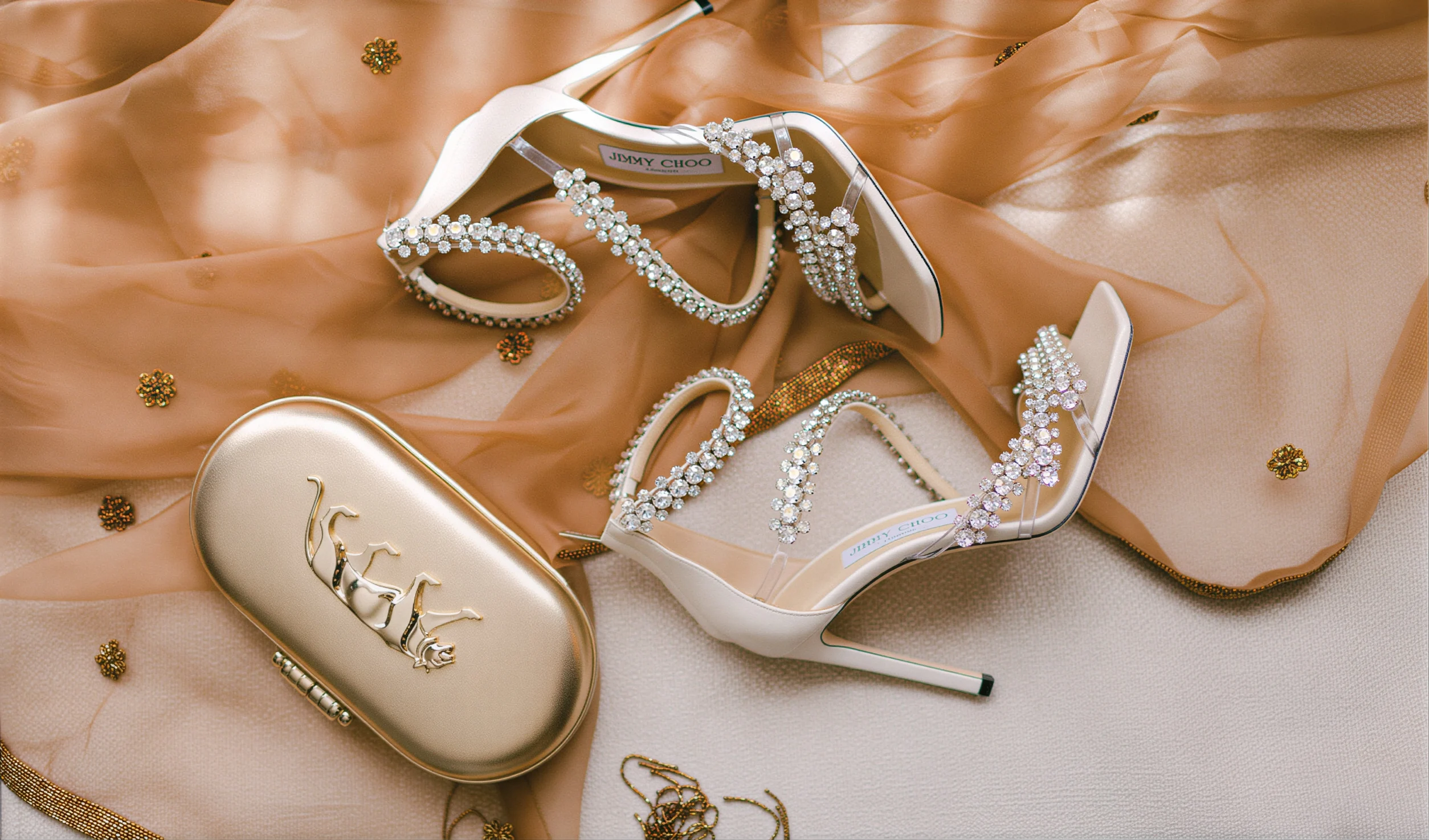 Bridal accessories including heels, clutch and jewellery used during bridal styling consultation